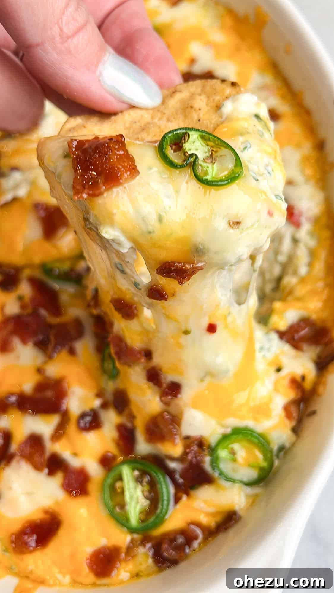 Creamy Baked Tex-Mex Jalapeno Chicken Dip 3 Close-up of baked jalapeno chicken dip, perfect for game day