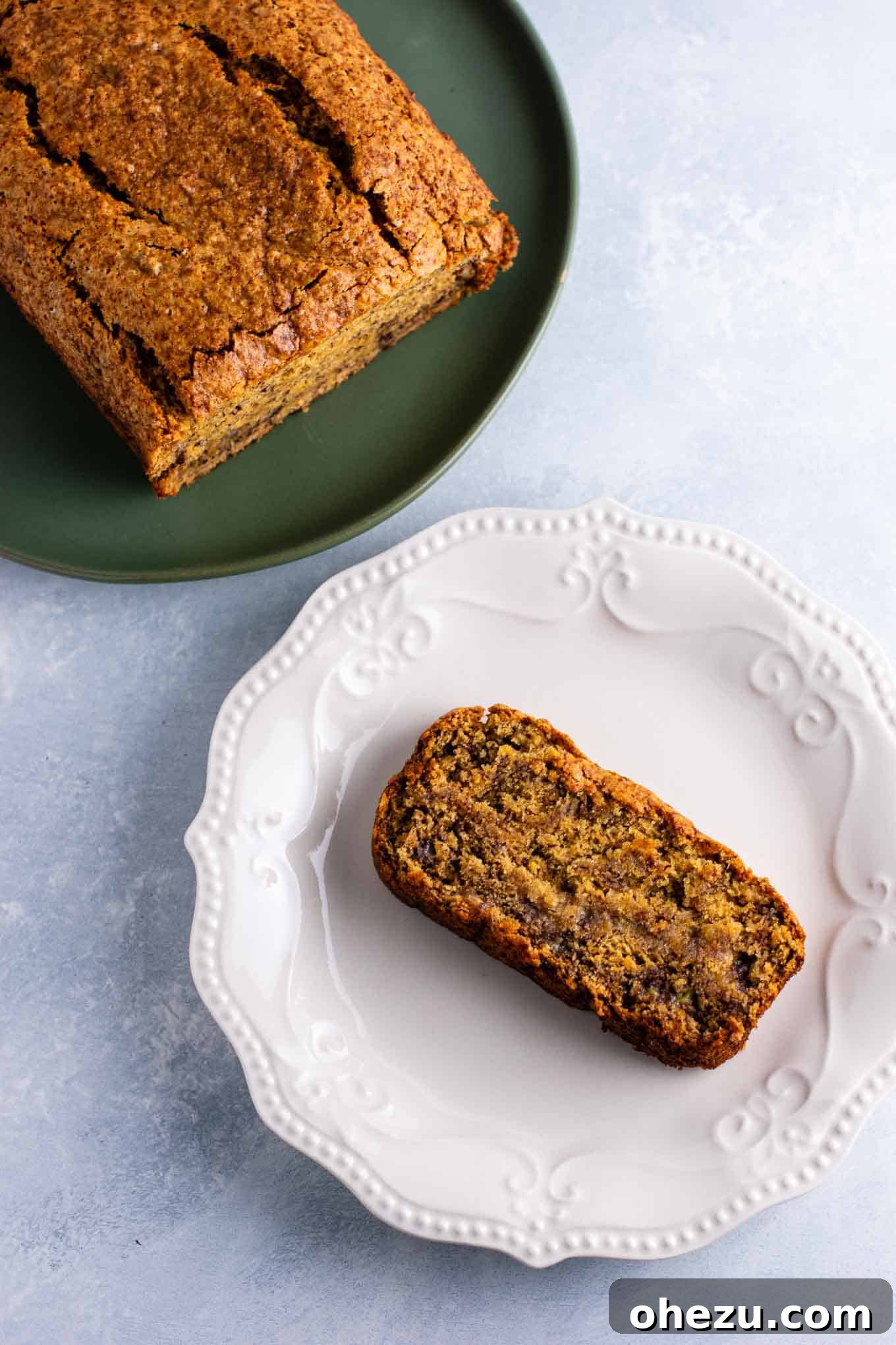 Ultimate Vegan Banana Bread 4 Freshly baked vegan banana bread loaf cooling on a wire rack, ready to be sliced and enjoyed. A simple, wholesome, and delicious plant-based treat.