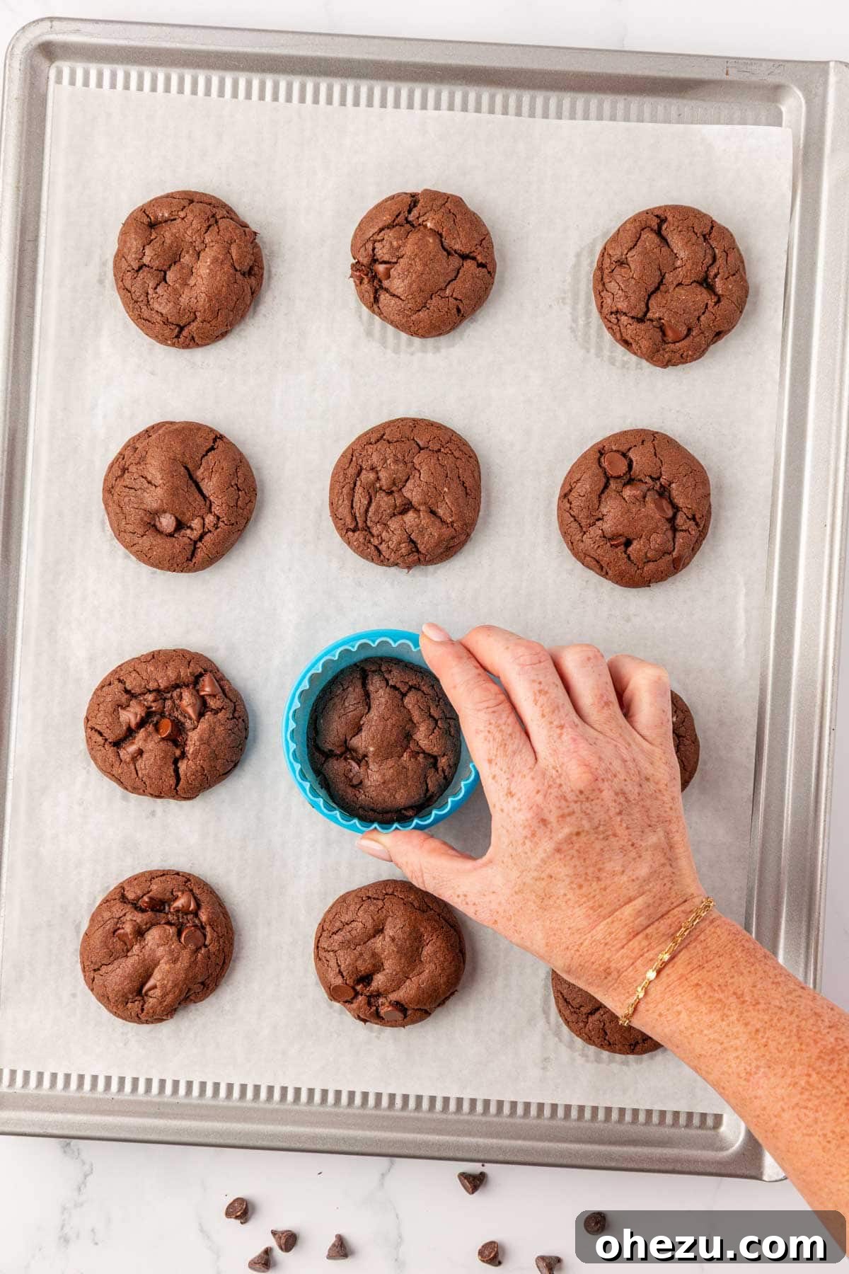 Irresistible Chocolate Cake Mix Cookies 12 Using a spoon to gently round the edges of warm chocolate cake mix cookies for a perfect shape