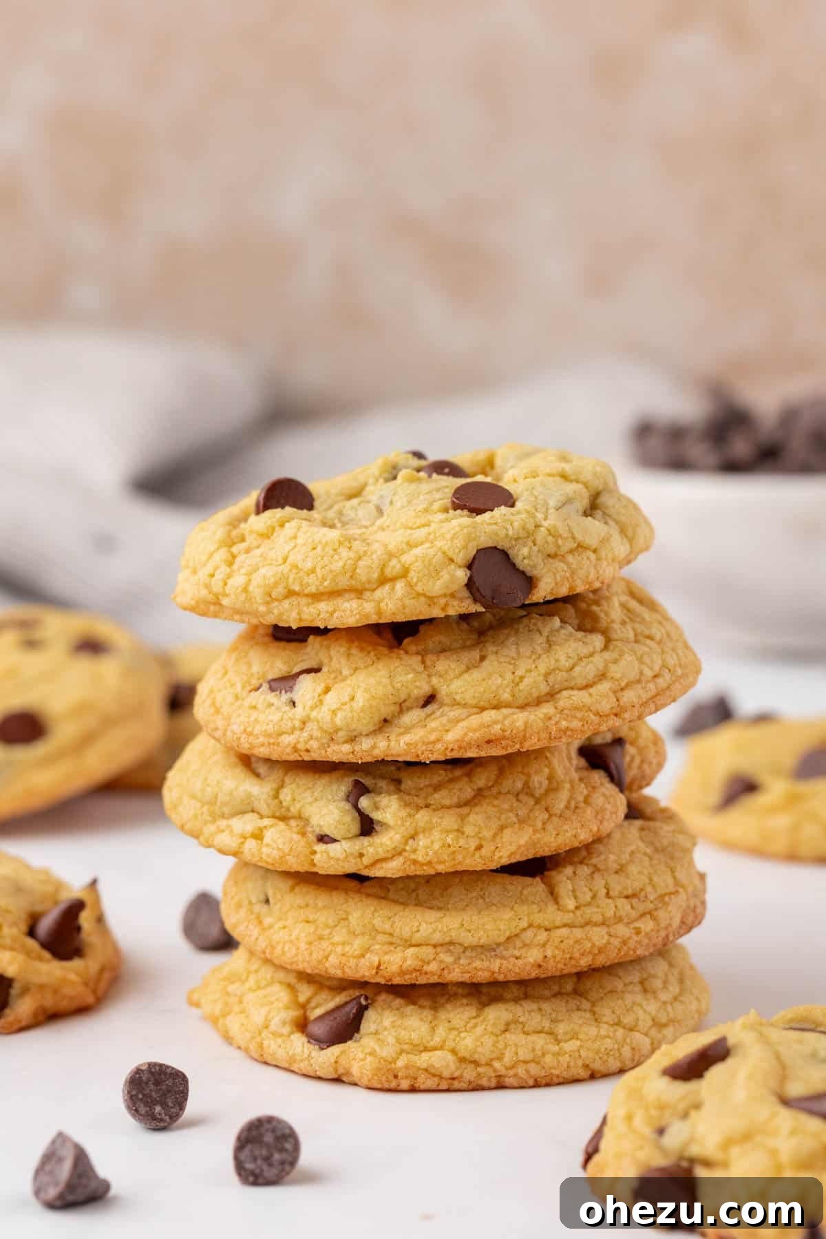 Stack of freshly baked cake mix chocolate chip cookies, golden brown with melted chocolate chips