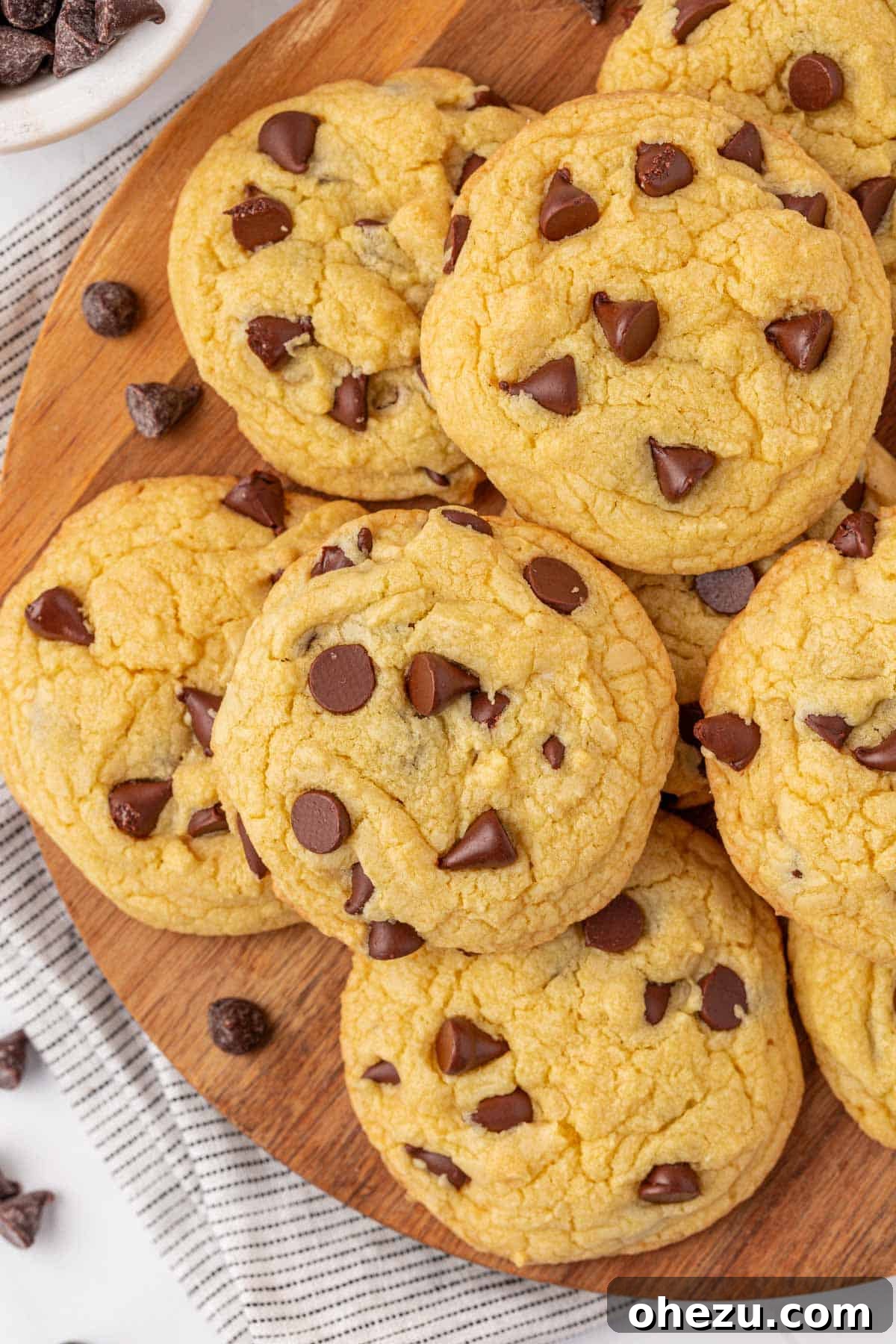 A close-up of a plate of cake mix chocolate chip cookies with a sprinkle of sea salt