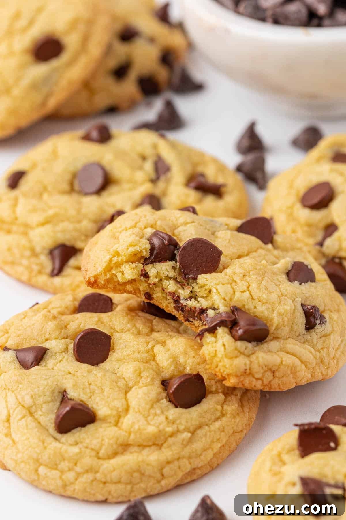 Close-up of a plate of warm cake mix chocolate chip cookies, showing their soft texture
