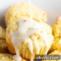 Gluten-free lemon muffins with a sweet lemon glaze. These are perfectly fluffy, do not fall apart, and taste amazing! #glutenfree #lemonmuffins #breakfast