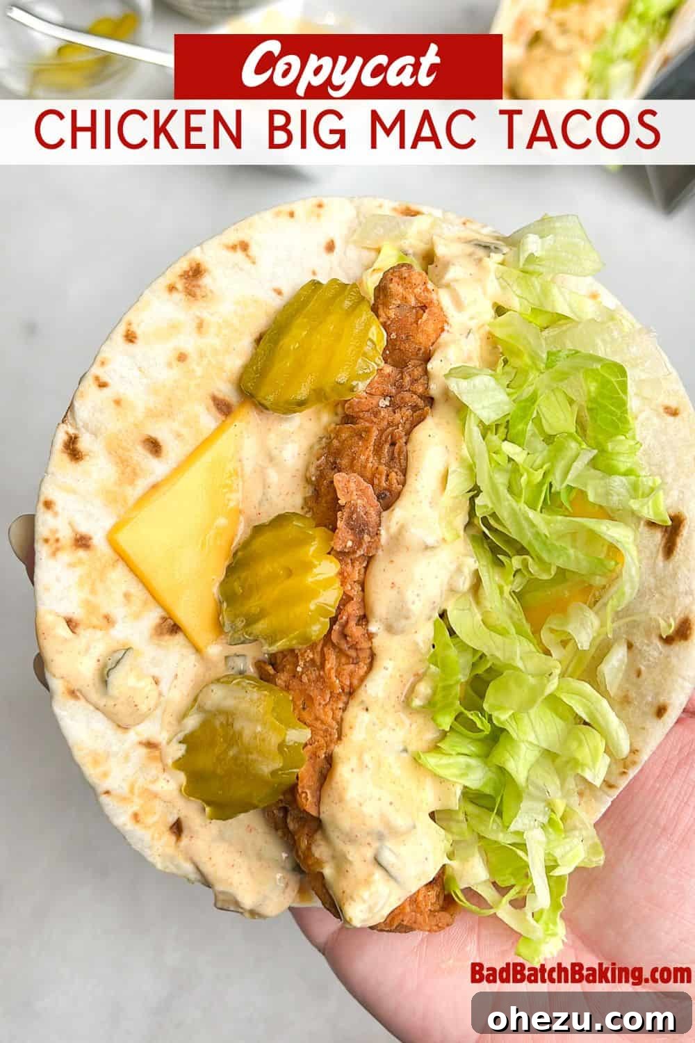 Ultimate Chicken Big Mac Taco 16 Another view of a delicious fried chicken taco with Big Mac sauce, fresh lettuce, and pickles, ready to be enjoyed.