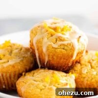 Gluten-free orange muffins with sweet glaze, presented beautifully