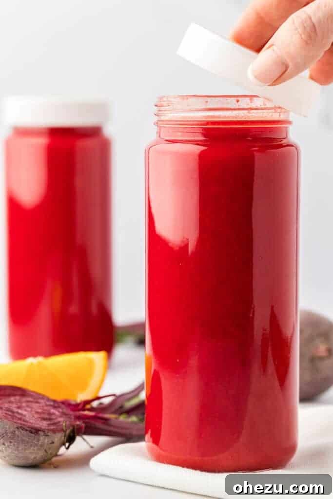 beet and carrot juice in a storage glass