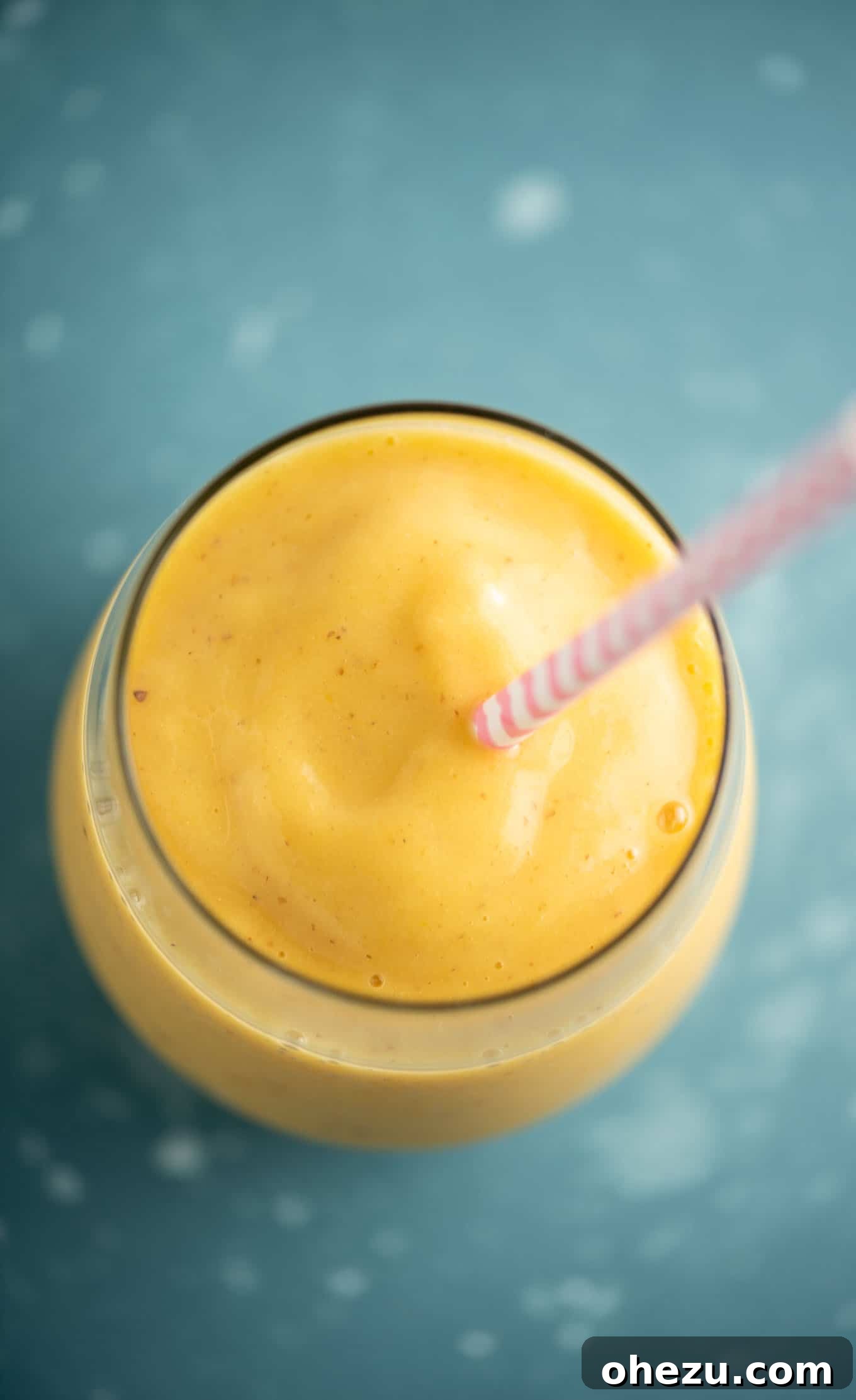 Golden Mango Pineapple Bliss 3 mango smoothie up close to show the thickness