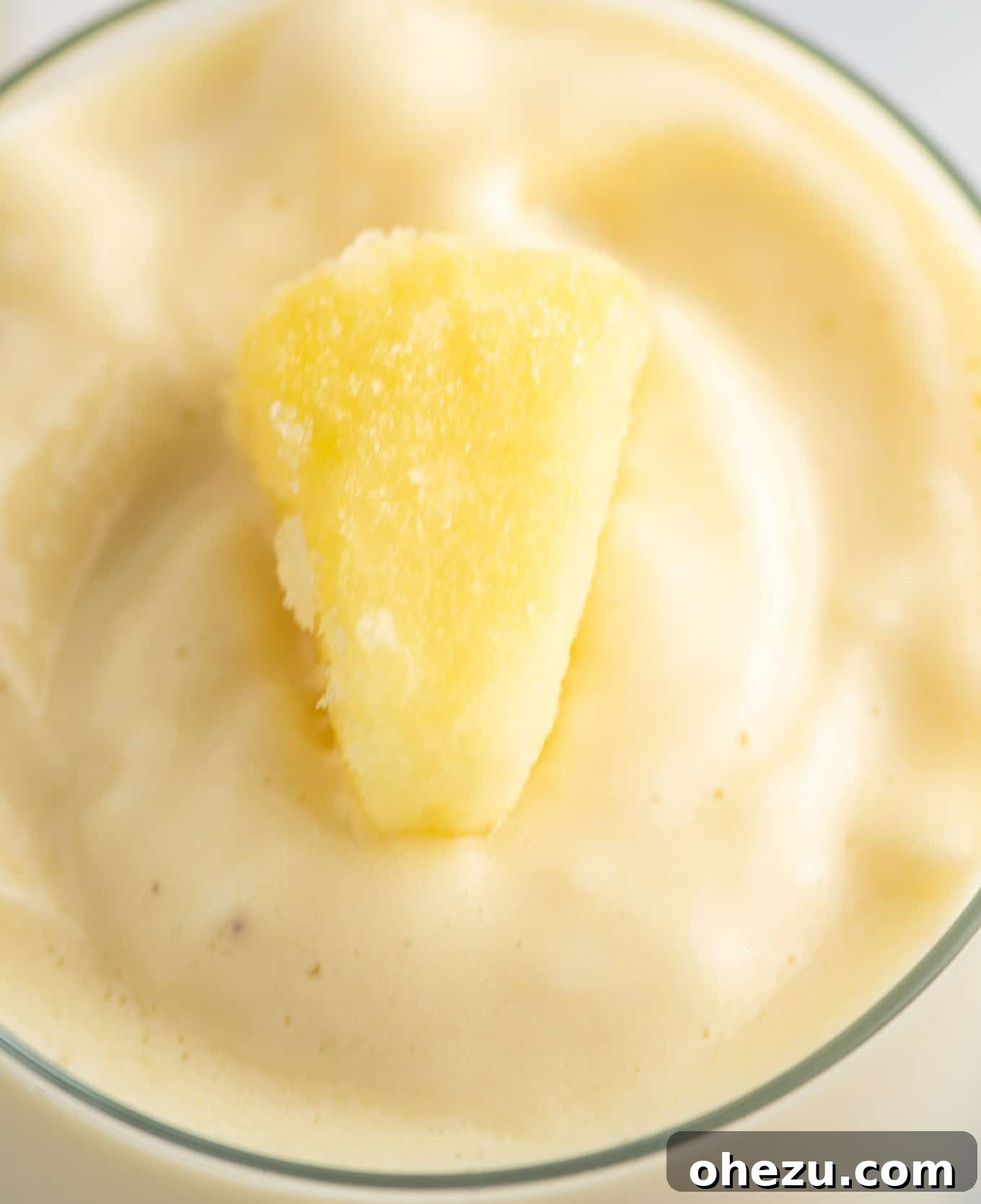 Golden Pineapple Chill 5 A close-up view of bright yellow frozen pineapple chunks, showing their icy texture and readiness for blending.
