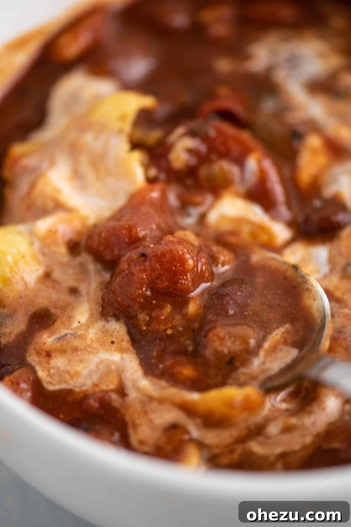A close-up image of the finished vegetarian chili in a bowl, highlighting its rich texture and color.