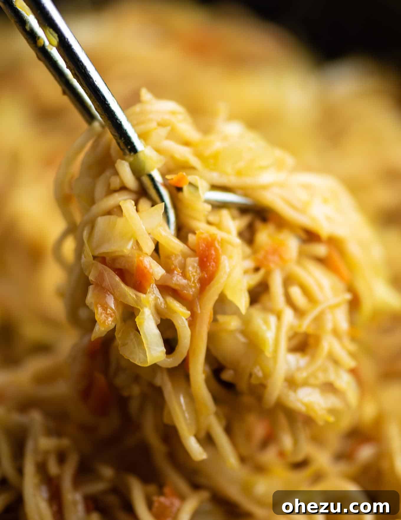 A perfectly cooked serving of ramen noodles, ready to be incorporated into the stir fry.