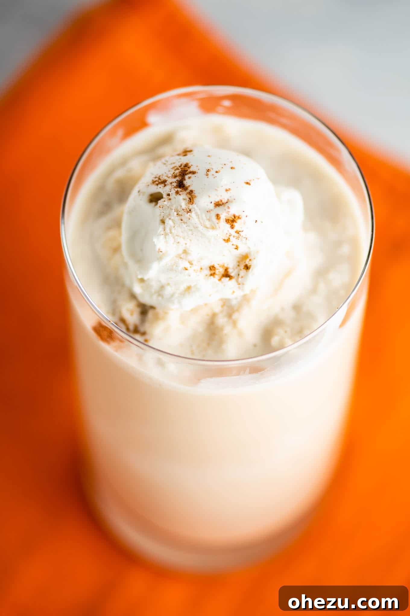 Chilled Pumpkin Dream 3 pumpkin coffee drink sitting on an orange napkin, visually appealing