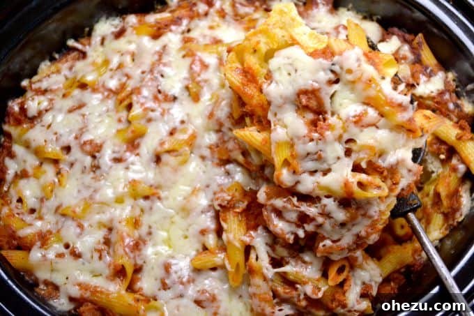 Effortless Slow Cooker Baked Ziti 21 A tightly sealed container of baked ziti, ready for refrigeration or freezing.