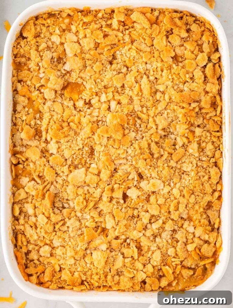 Close-up of the buttery Ritz cracker topping on broccoli casserole, perfectly golden