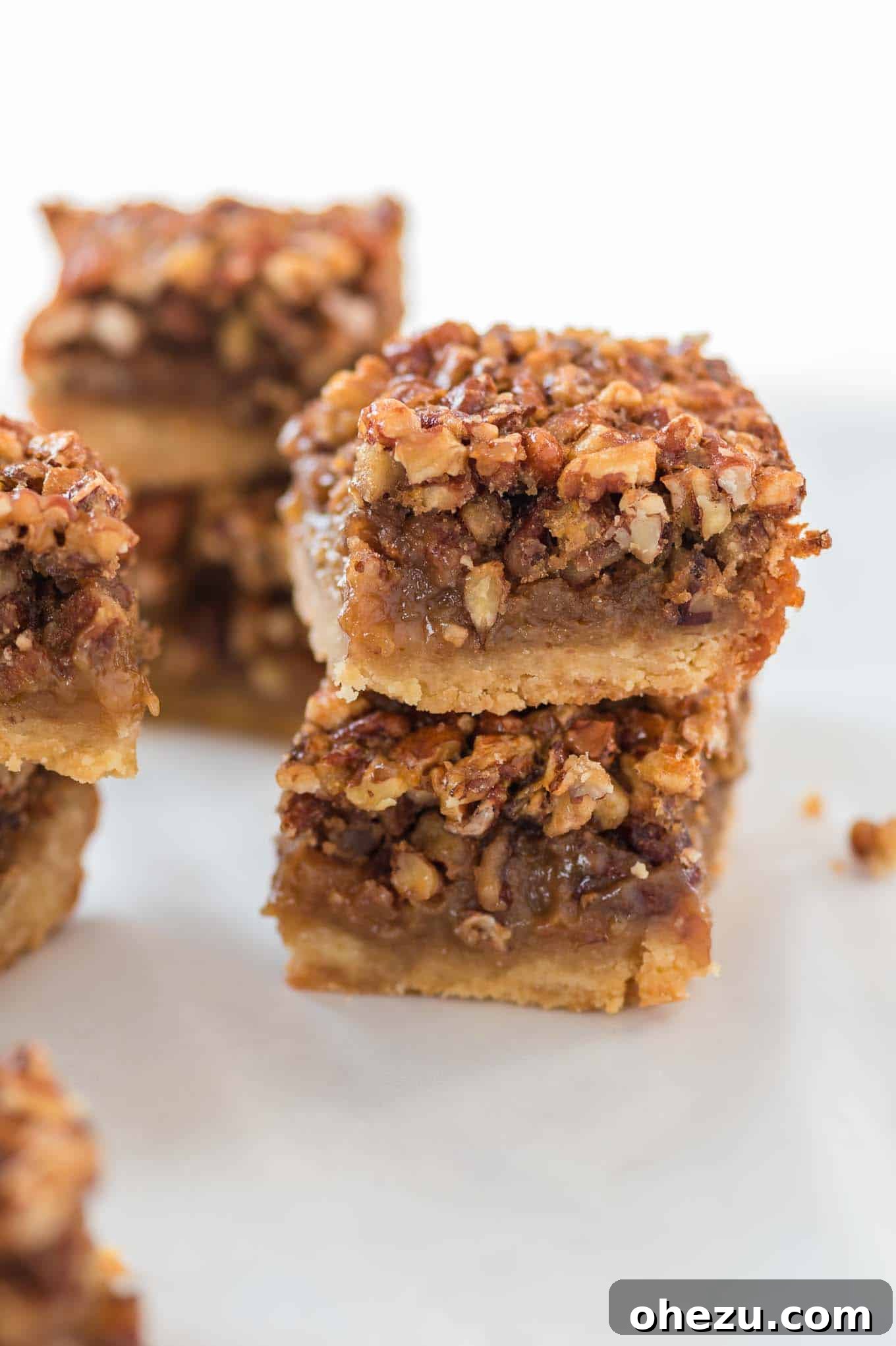 two pecan pie bars stacked