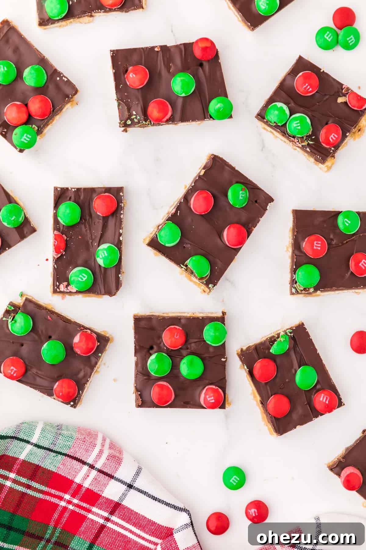 Irresistible Christmas Toffee Bark 16 Close-up of a large piece of Christmas Cracker Candy, showing the layers of cracker, toffee, and chocolate.