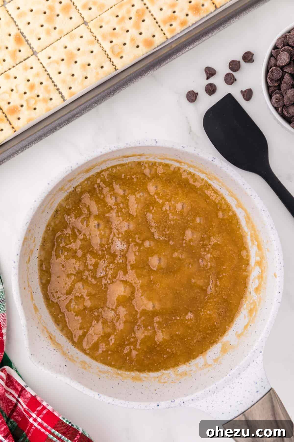 Irresistible Christmas Toffee Bark 8 The butter and brown sugar mixture after melting, bubbling and thickening into a rich caramel toffee.