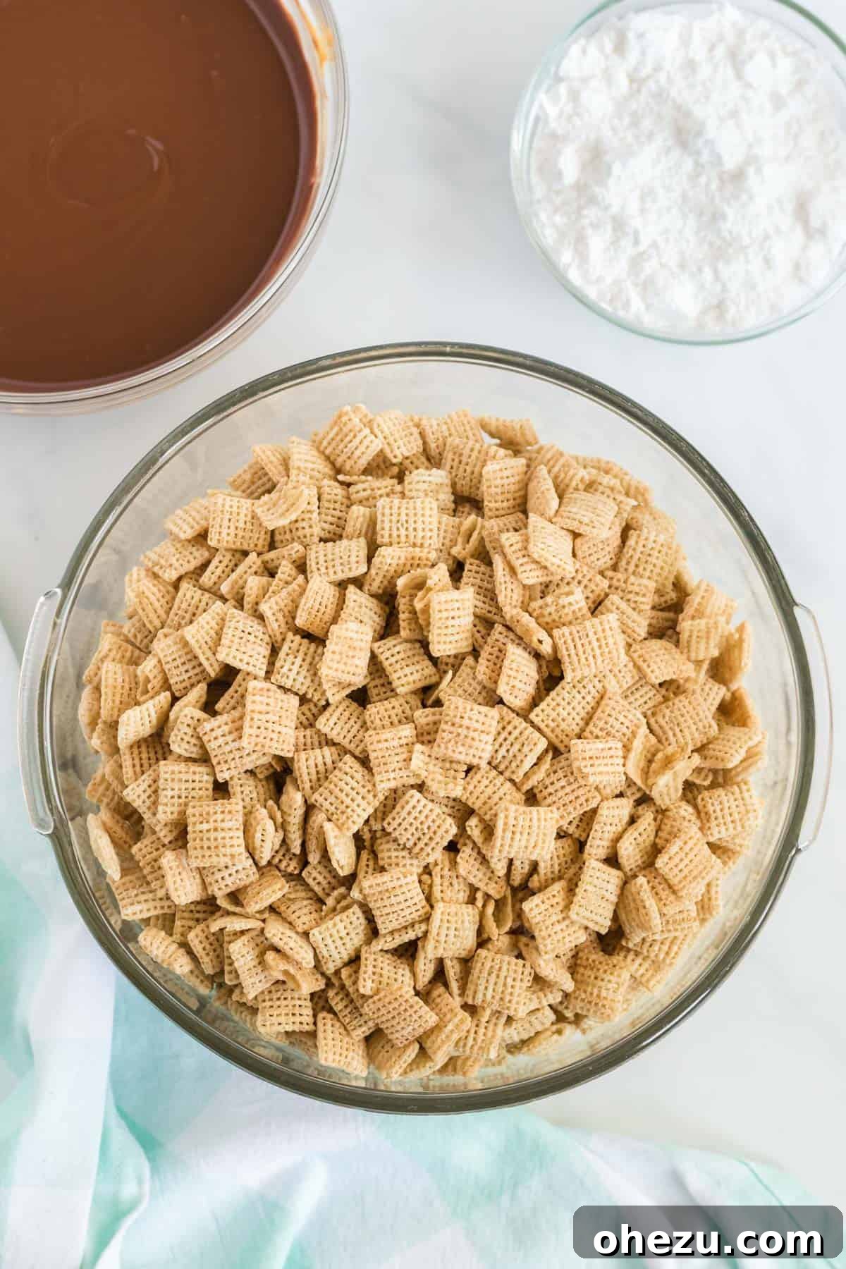 Vegan Chocolate Peanut Butter Cereal Crunch 6 Large bowl filled with plain Rice Chex cereal
