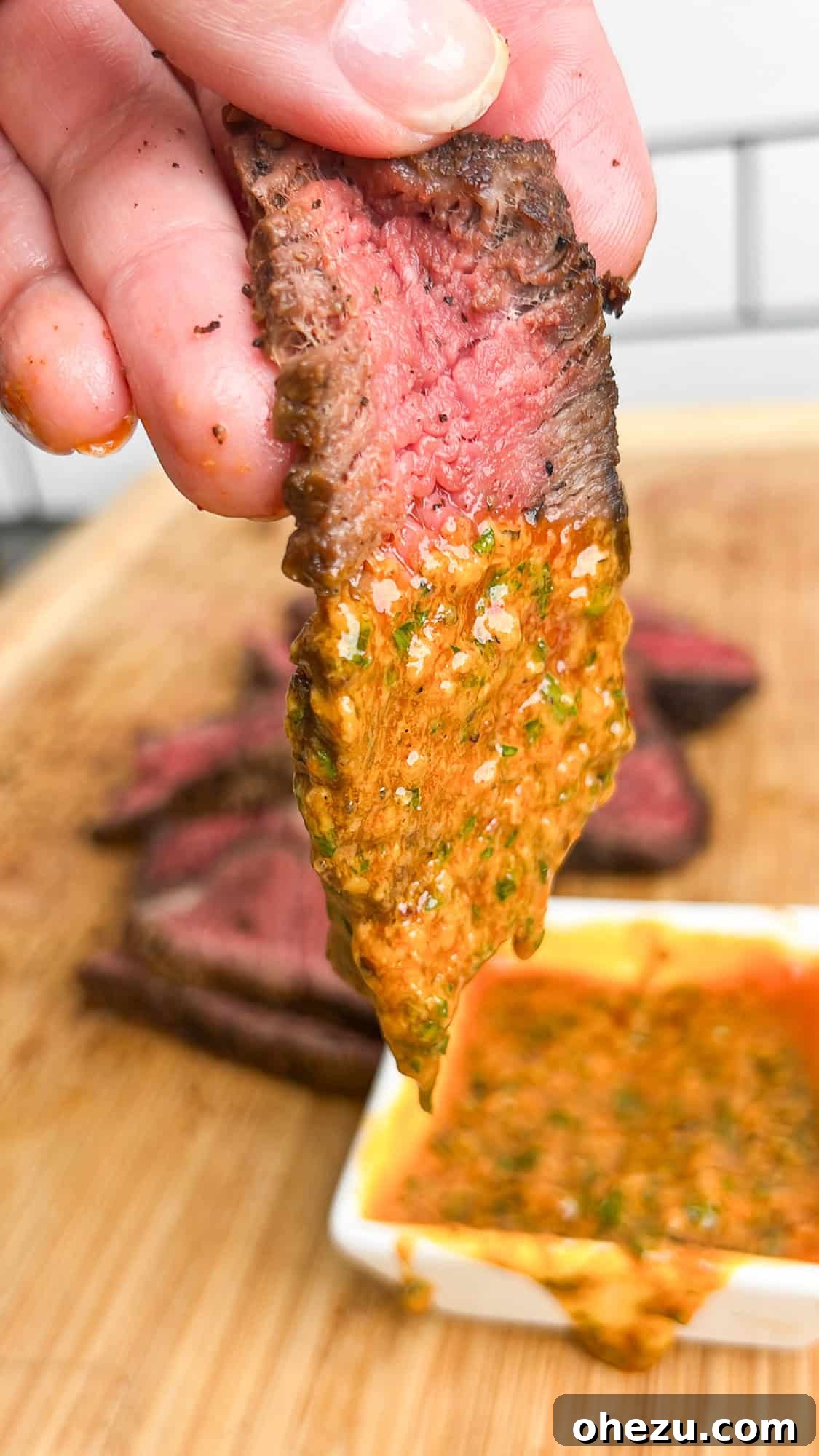 Rustic Herb Butter Steak 12 A slice of succulent steak generously coated in melted cowboy butter, ready to be enjoyed