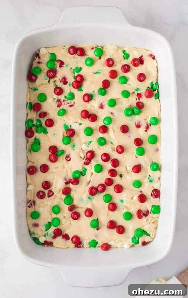topping the batter with more M&M's