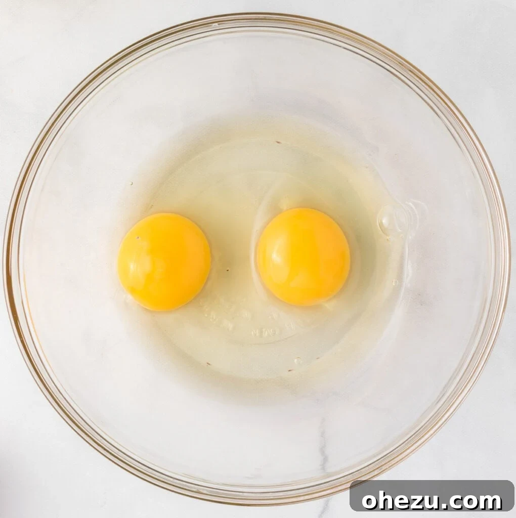 two eggs in a mixing bowl