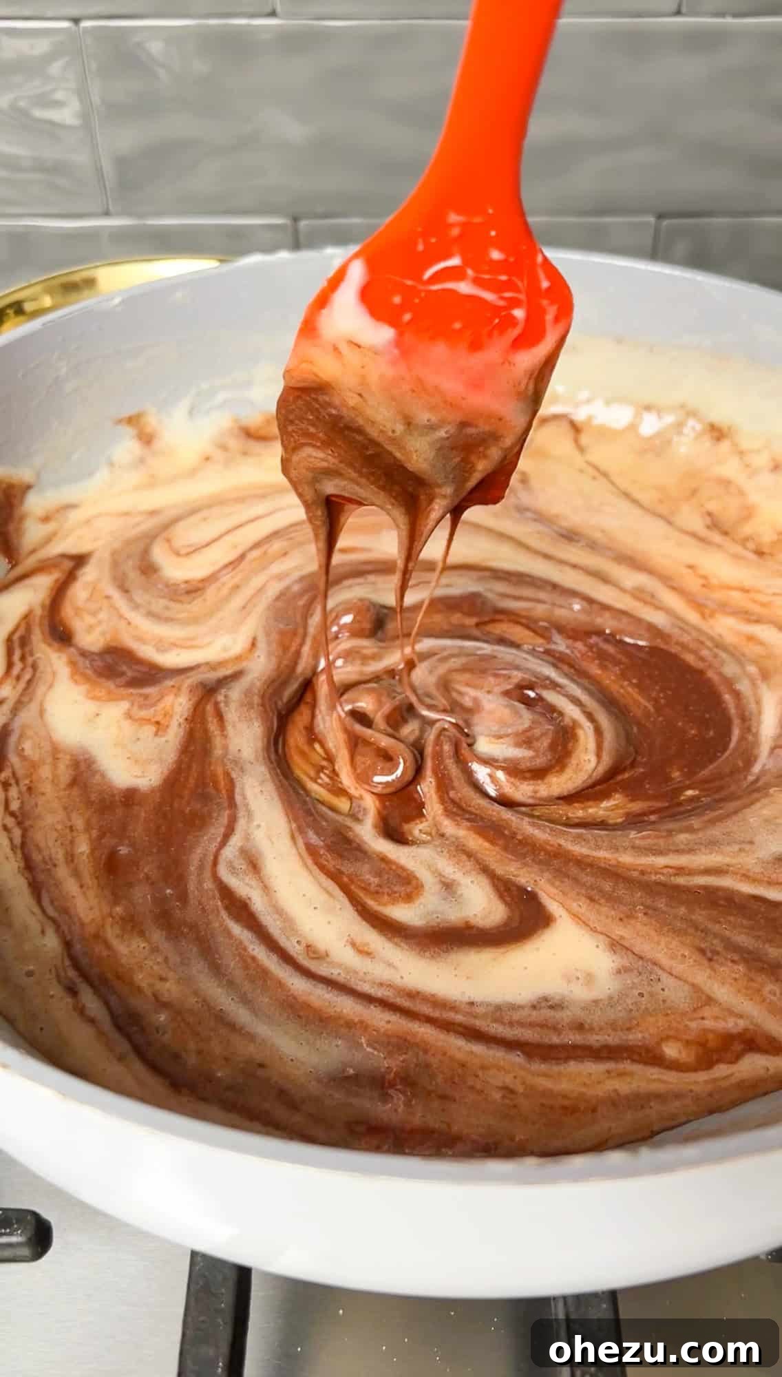 Cozy Cocoa Crisps 8 A perfectly smooth and glossy mixture of melted chocolate, butter, and marshmallows, ready for the cereal.