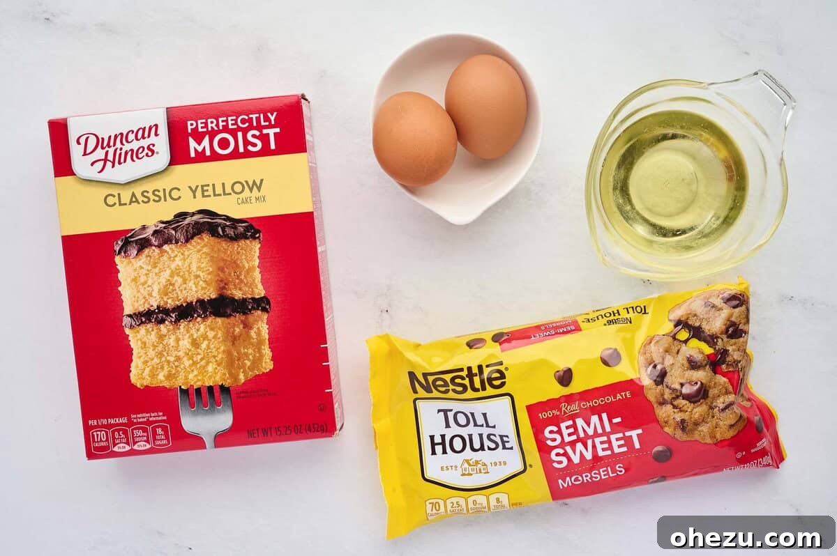 The four simple ingredients: cake mix, eggs, oil, and chocolate chips, ready for baking
