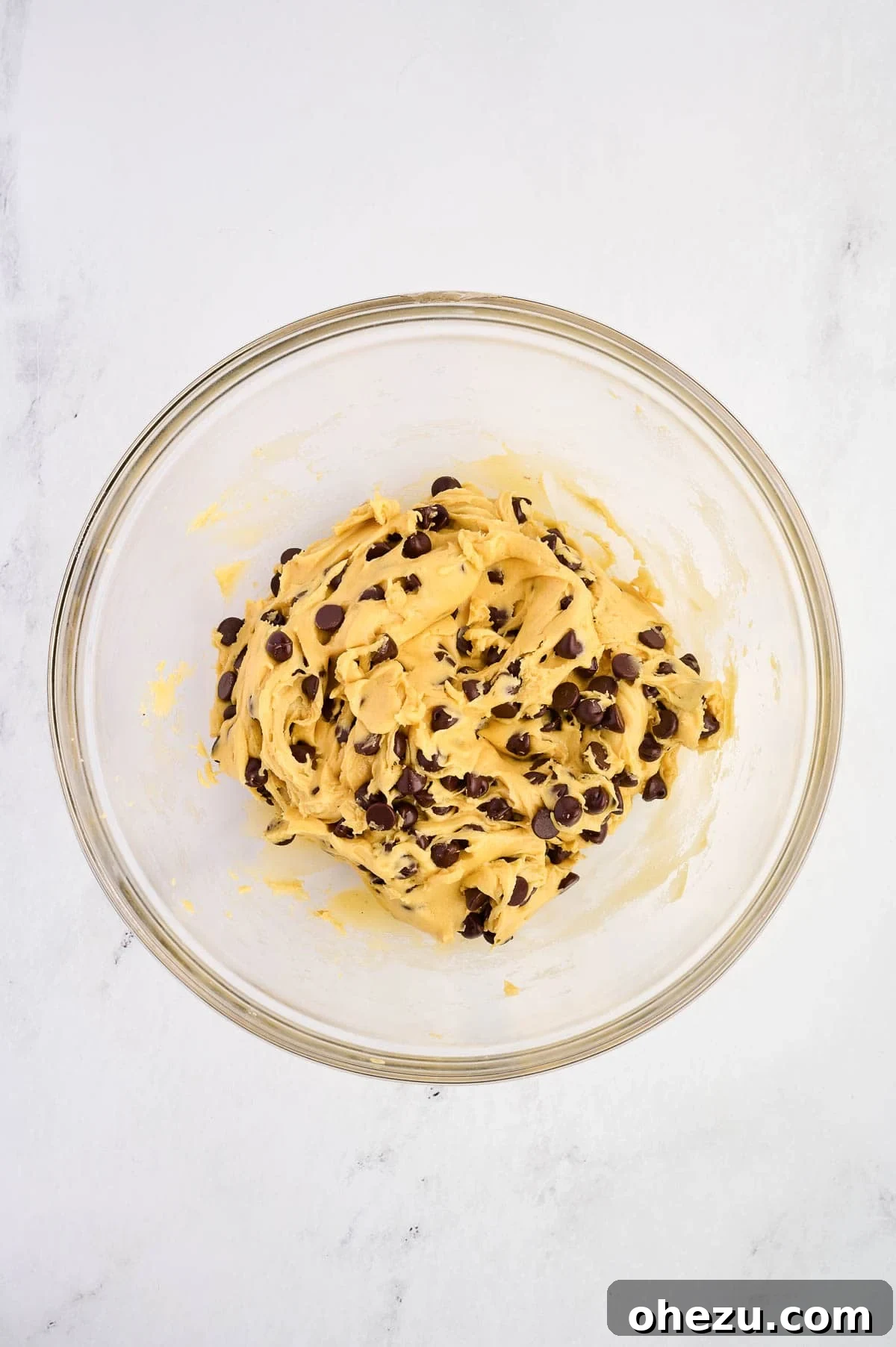 Thick cake mix cookie bar batter, fully mixed and ready to be pressed