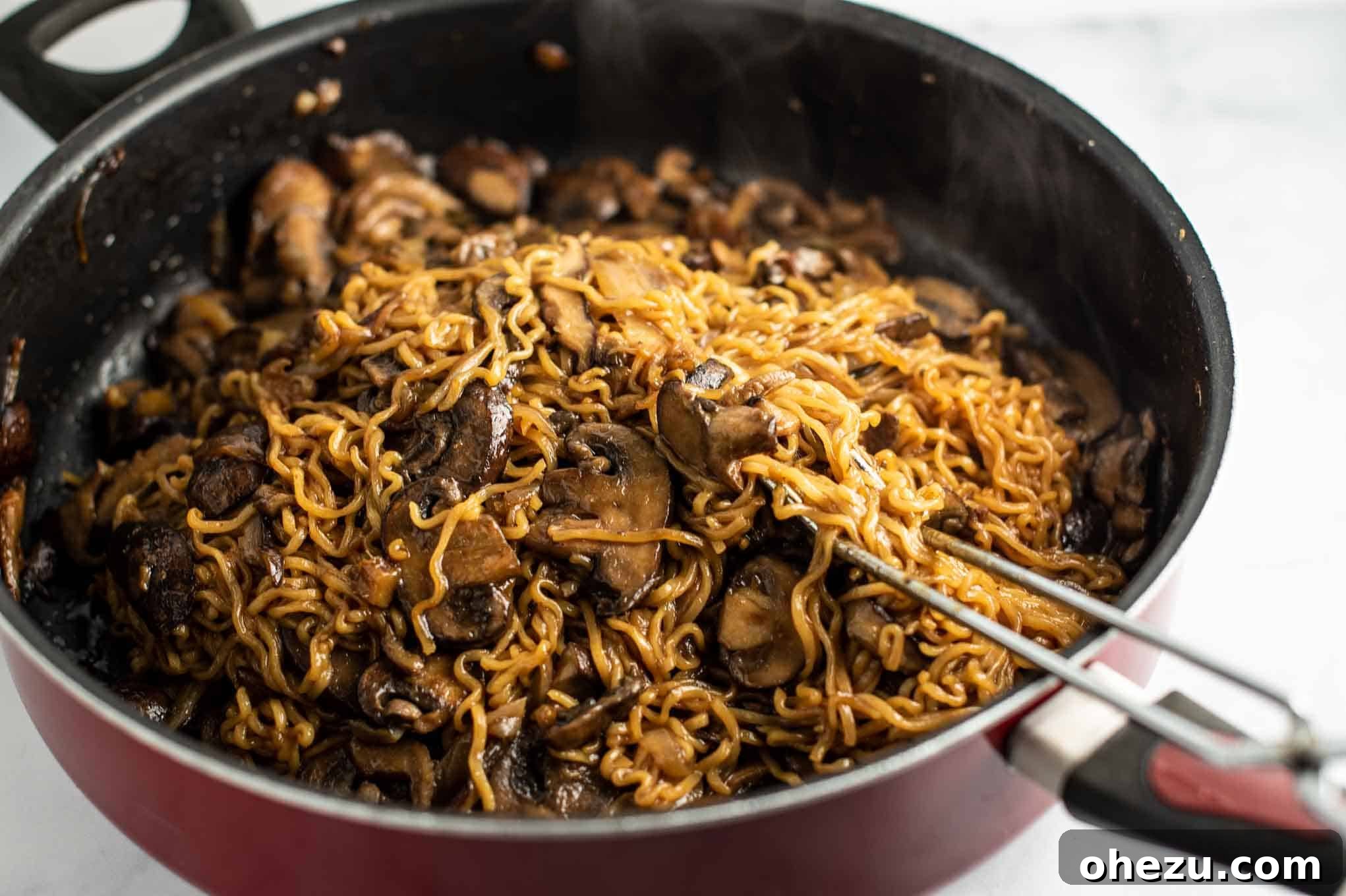 jumbo cooker full of Asian mushroom ramen noodles, ready to be served