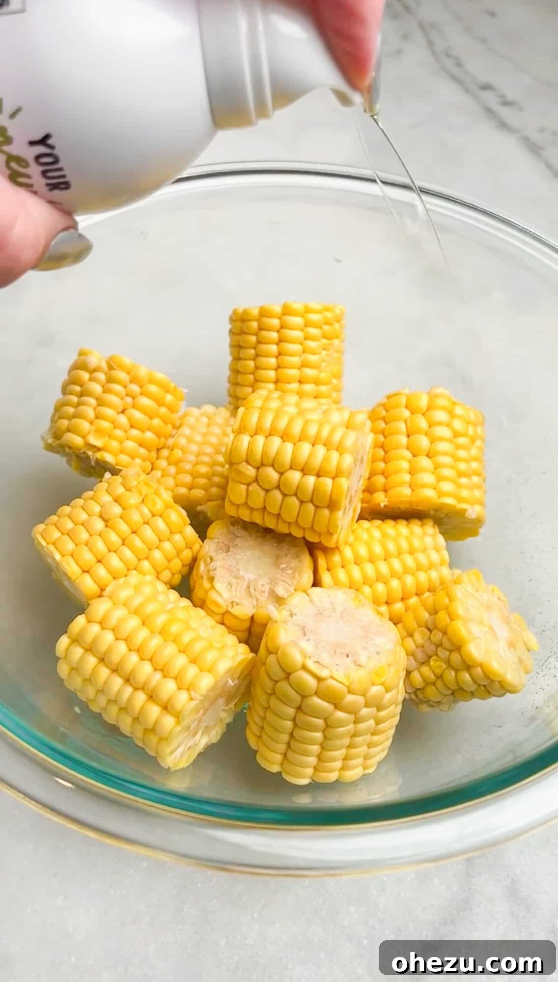 spritzing corn with oil