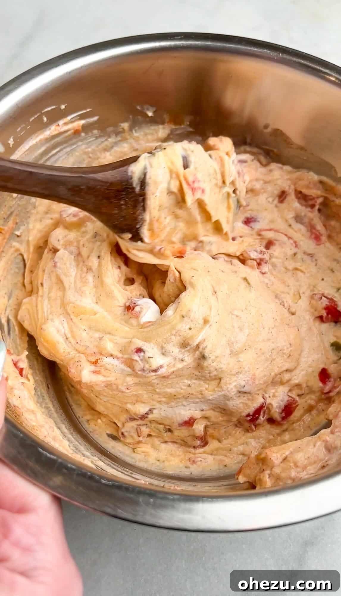 cream sauce being mixed together