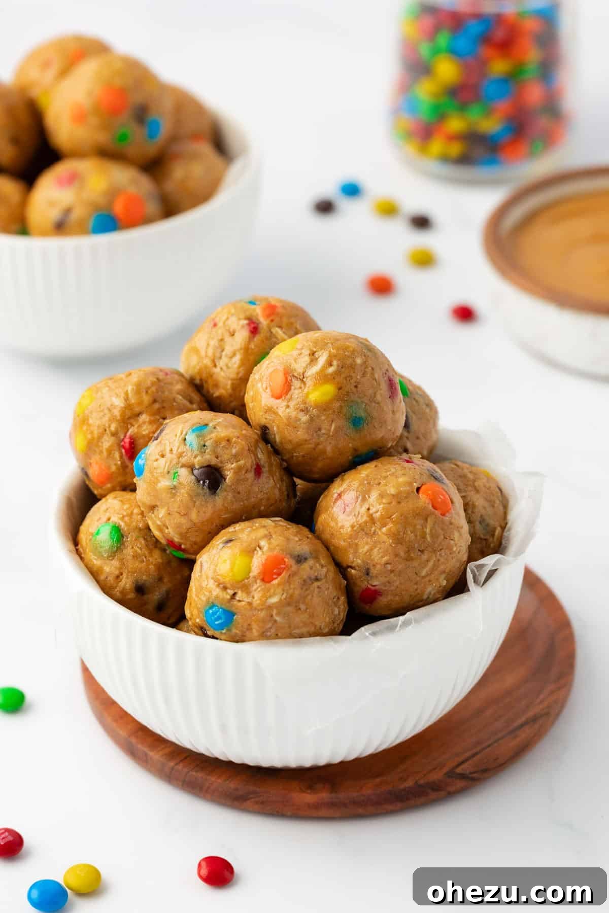 Ultimate Monster Cookie Fuel Bites 3 Close-up shot of several monster cookie bites showcasing their texture and colorful M&M inclusions.