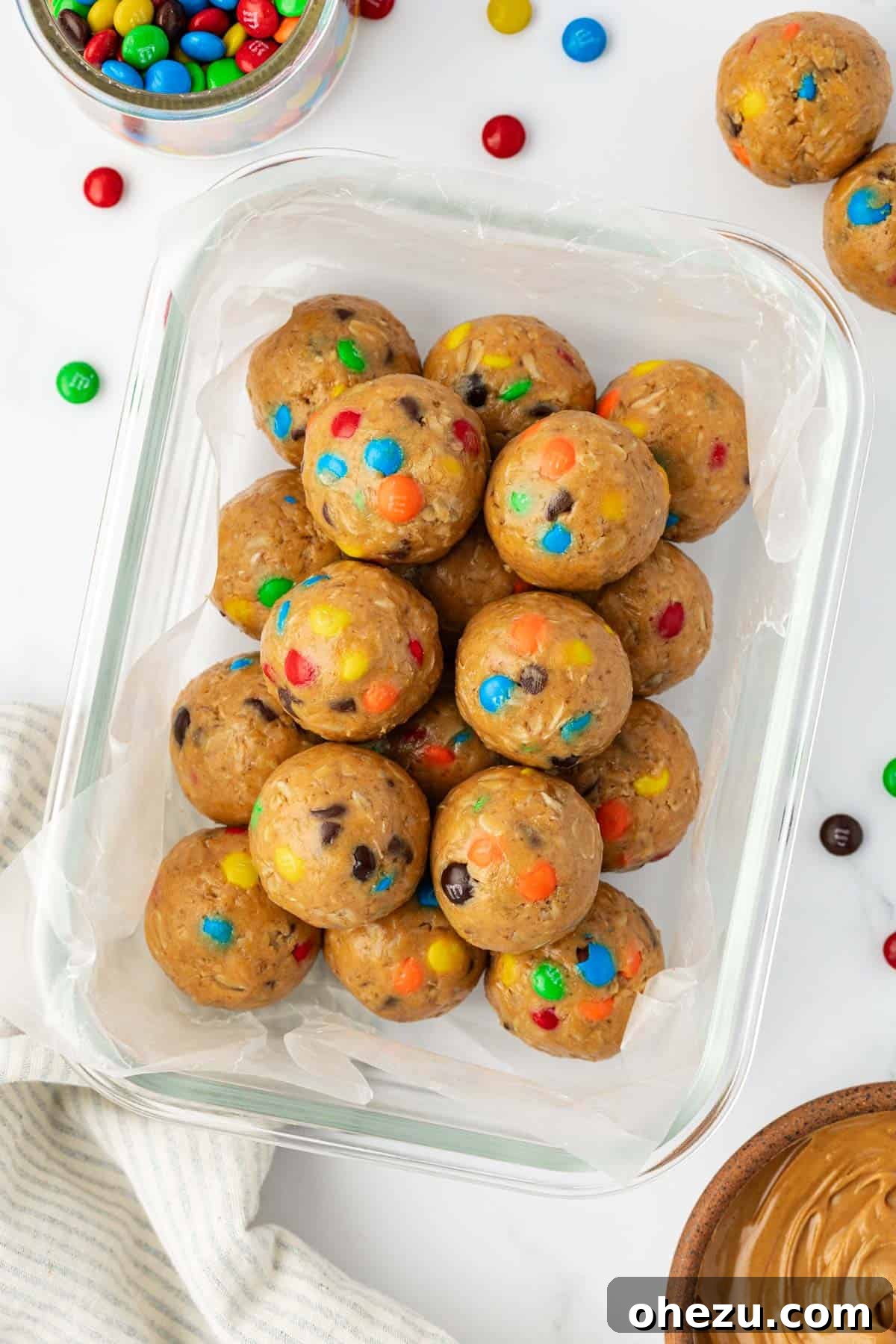 Ultimate Monster Cookie Fuel Bites 10 Chilled monster cookie protein balls stored in a clear rectangular storage container.