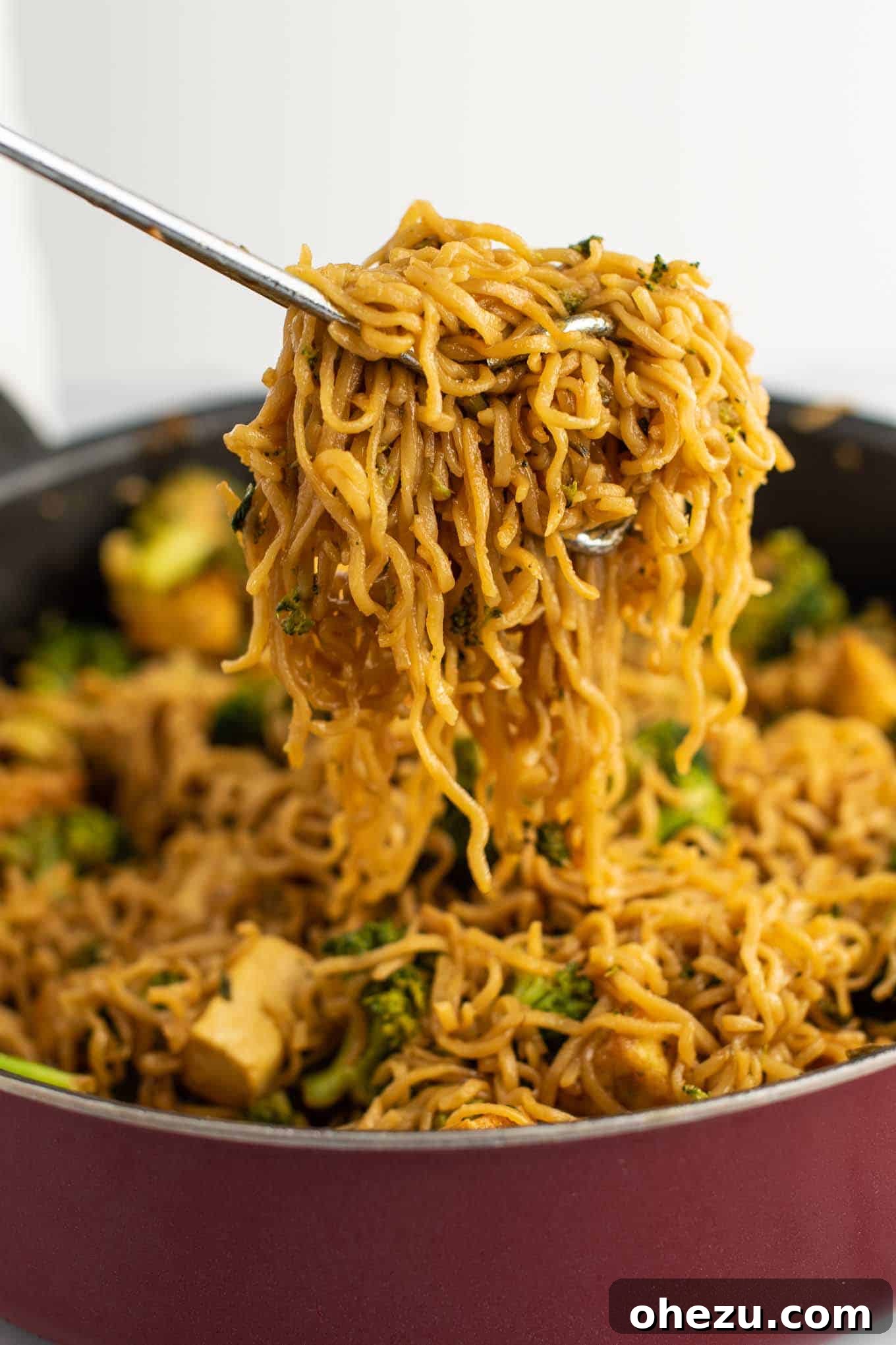 A single serving of broccoli tofu ramen noodles, garnished and ready to eat