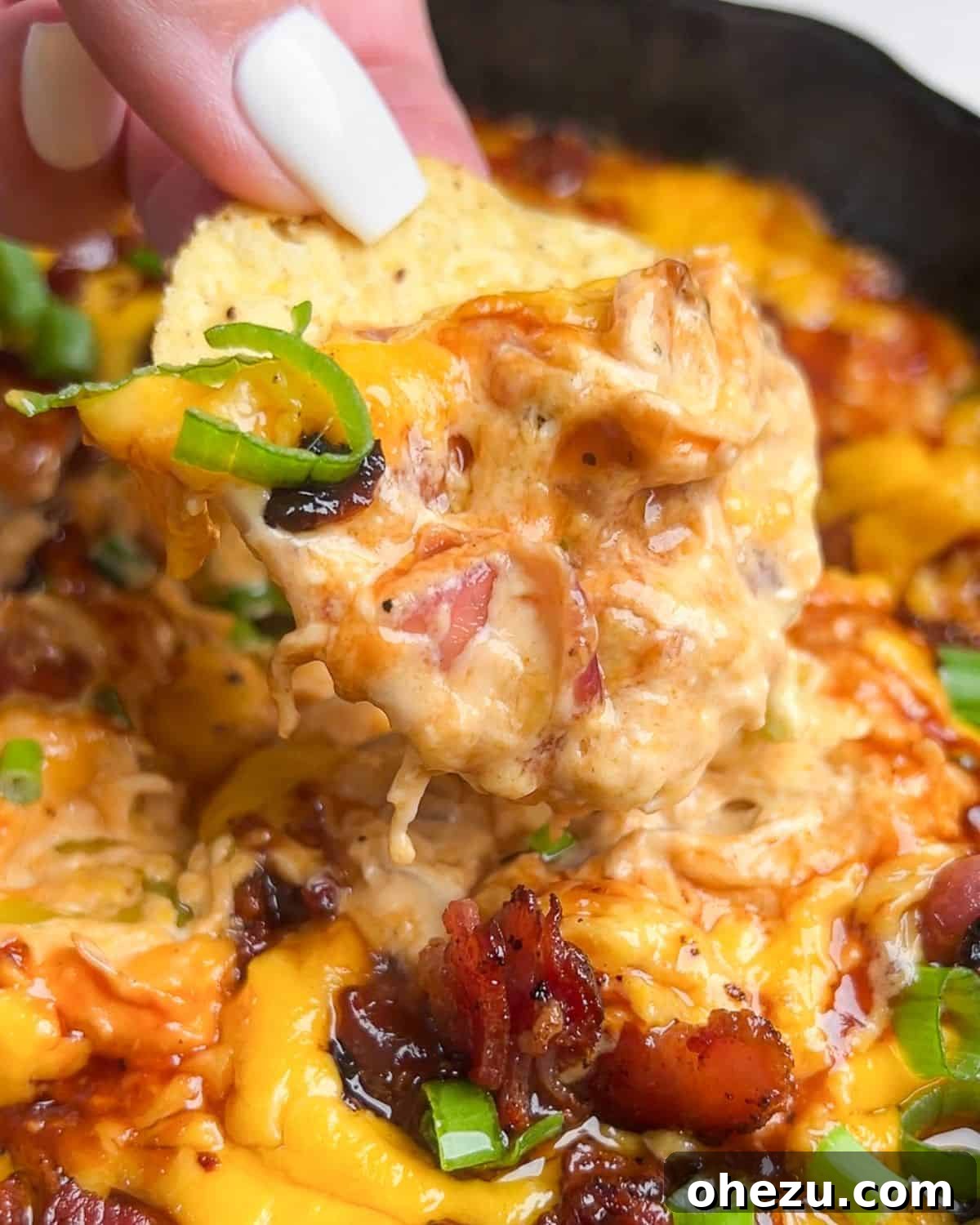 Over 20 Must-Try Recipes for Your Memorial Day Cookout 14 Sweet and smoky Cheesy Barbecue Chicken Dip, perfect for summer.