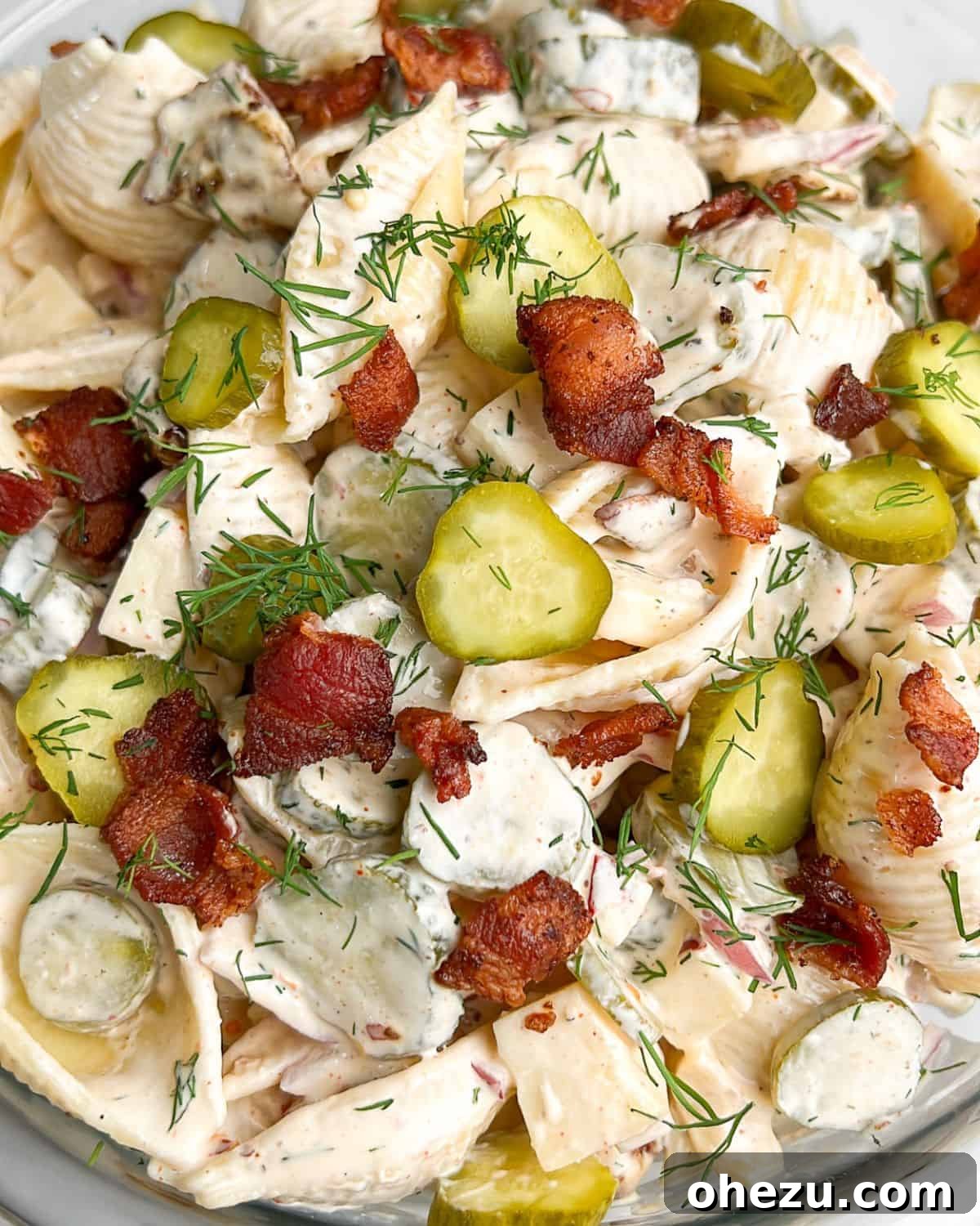 Over 20 Must-Try Recipes for Your Memorial Day Cookout 17 Unique Bacon Creamy Dill Pickle Pasta Salad, bursting with flavor.