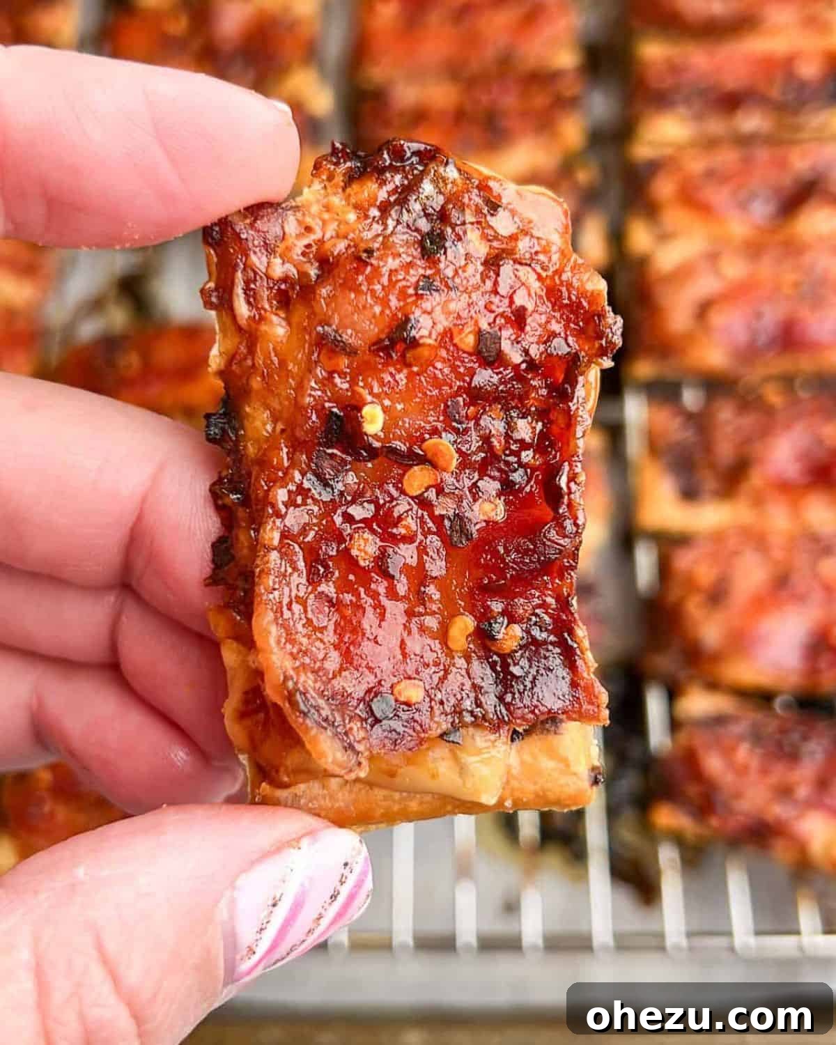 Over 20 Must-Try Recipes for Your Memorial Day Cookout 3 Crispy Parmesan Candied Bacon Crackers, a perfect party appetizer.