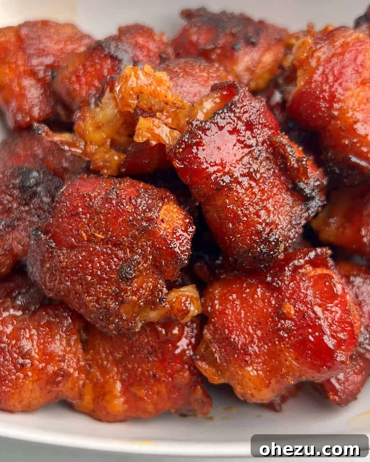 Over 20 Must-Try Recipes for Your Memorial Day Cookout 8 Crispy Cheesy Bacon Wrapped Chicken Bites, air-fried to perfection.