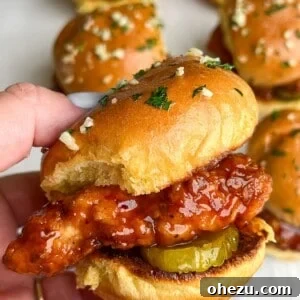 Hot Honey Chicken Slider held in hand