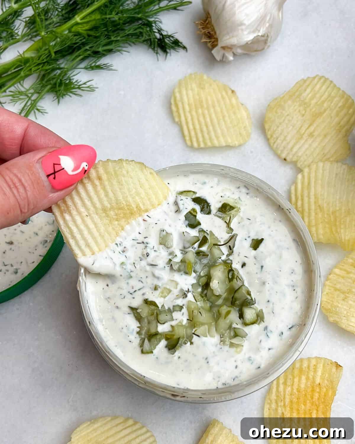 Dillicious Dip Sensation 2 Creamy ranch dill pickle dip served in a bowl, ready for dipping.