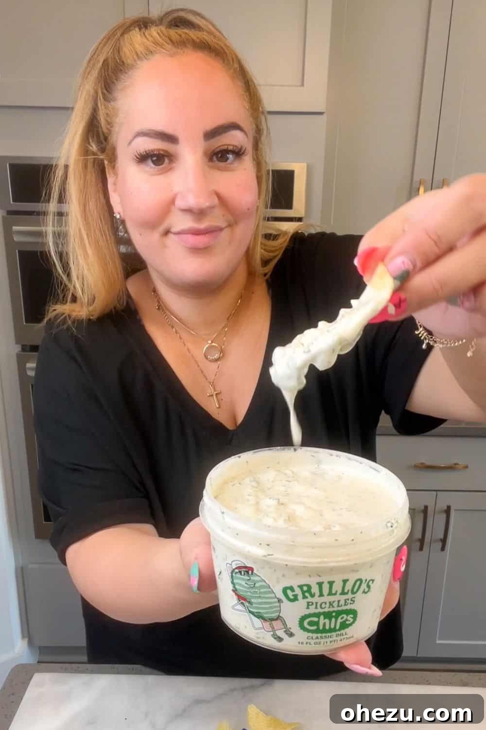 Dillicious Dip Sensation 3 Homemade dill pickle dip stored in a repurposed Grillo's pickle tub, showcasing convenience.
