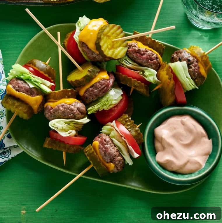 Pickle Cheeseburger Bites arranged on a platter, showcasing their creative bun substitute.