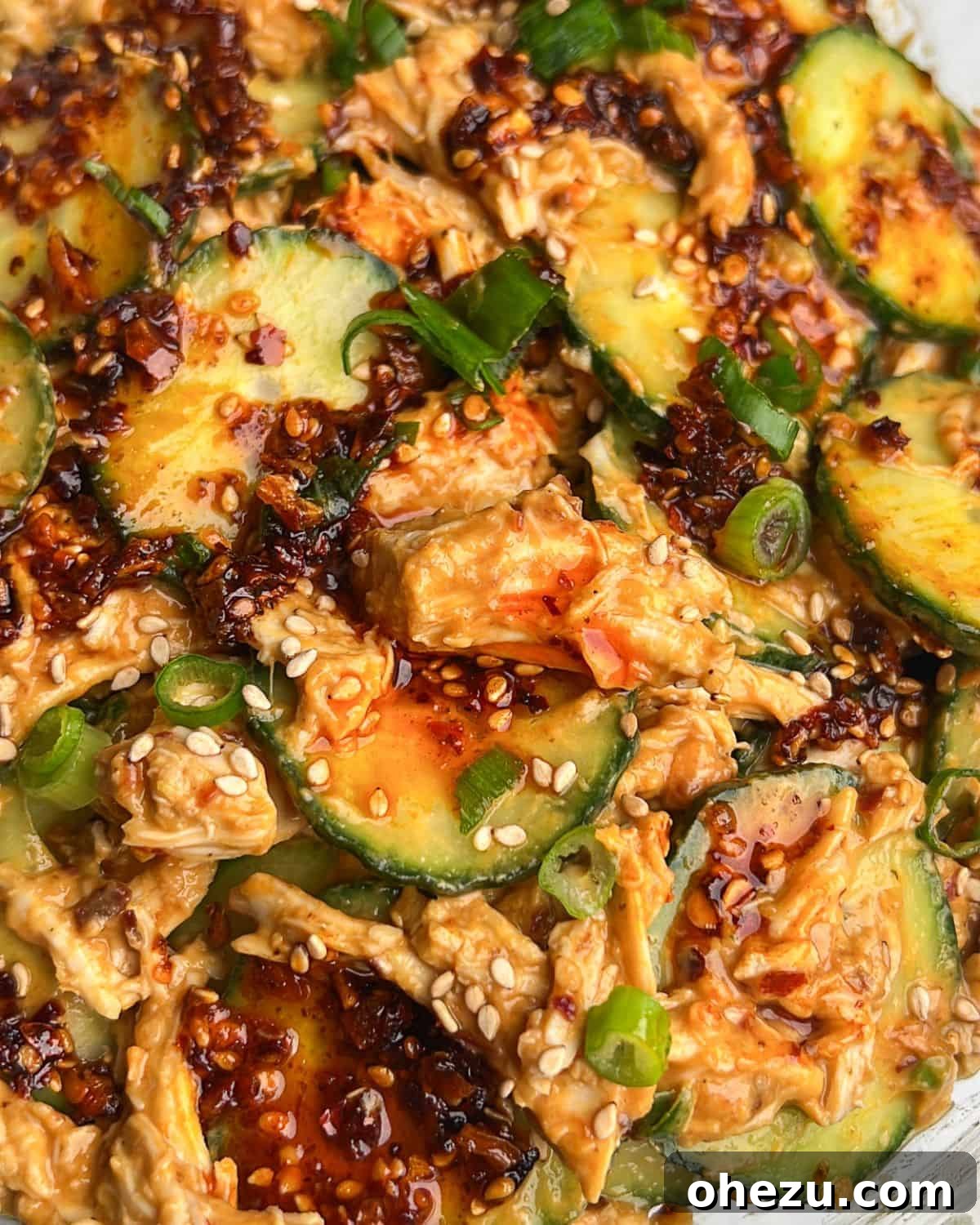 thai cucumber salad with chicken in a bowl
