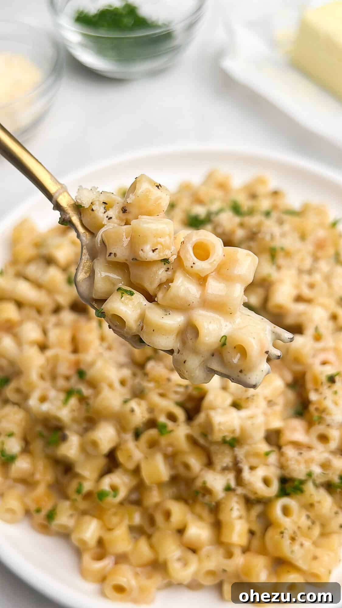 25 Effortless Meals for Busy School Days 11 Close-up of creamy One-Pan Butter Parmesan Pasta on a fork