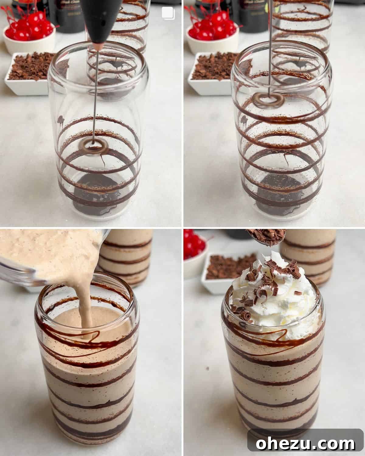 A finished frozen mudslide cocktail, garnished with whipped cream, a cherry, and chocolate shavings, ready to be served.
