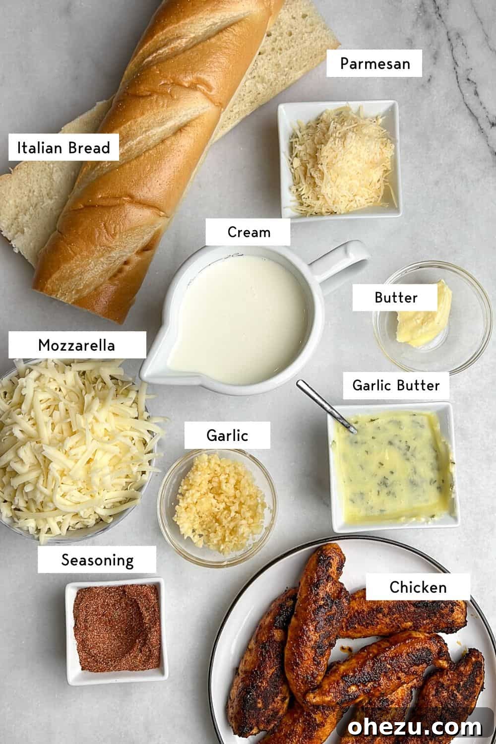 Labeled ingredients for preparing Chicken Alfredo Garlic Bread.