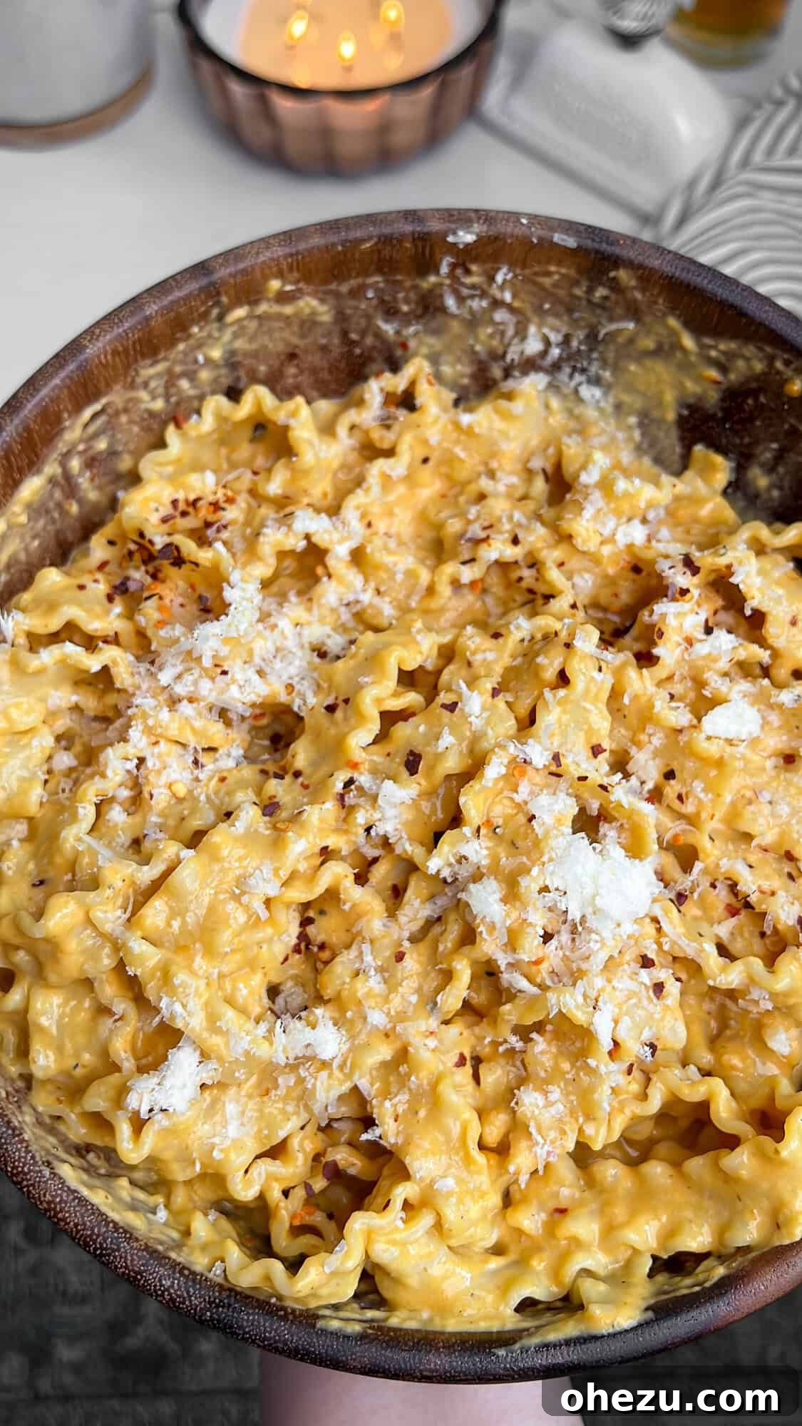Close-up shot of Pumpkin Alfredo pasta in a bowl, showcasing its creamy texture