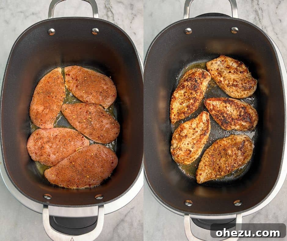 This slow cooker smothered chicken, with its creamy gravy and melt-in-your-mouth texture, is the ultimate cozy meal. And it's so easy! Searing boneless chicken breasts in a slow cooker pot to develop a flavorful crust.