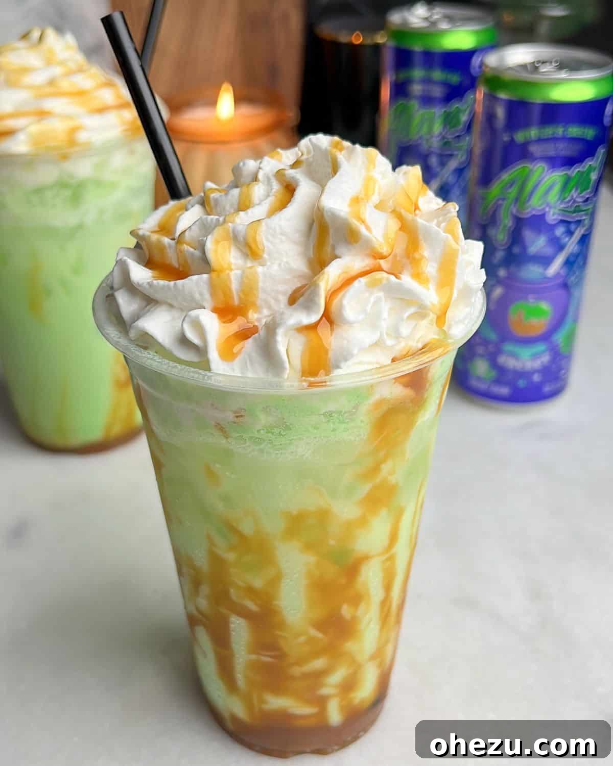 caramel apple drink with whipped cream on a counter, sparkling and ready to enjoy