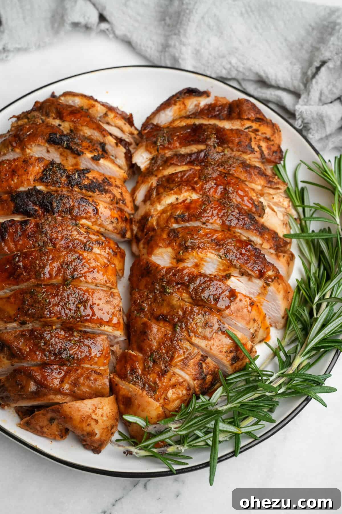 Bayou Blast Turkey 10 cajun butter turkey breasts sliced on a plate