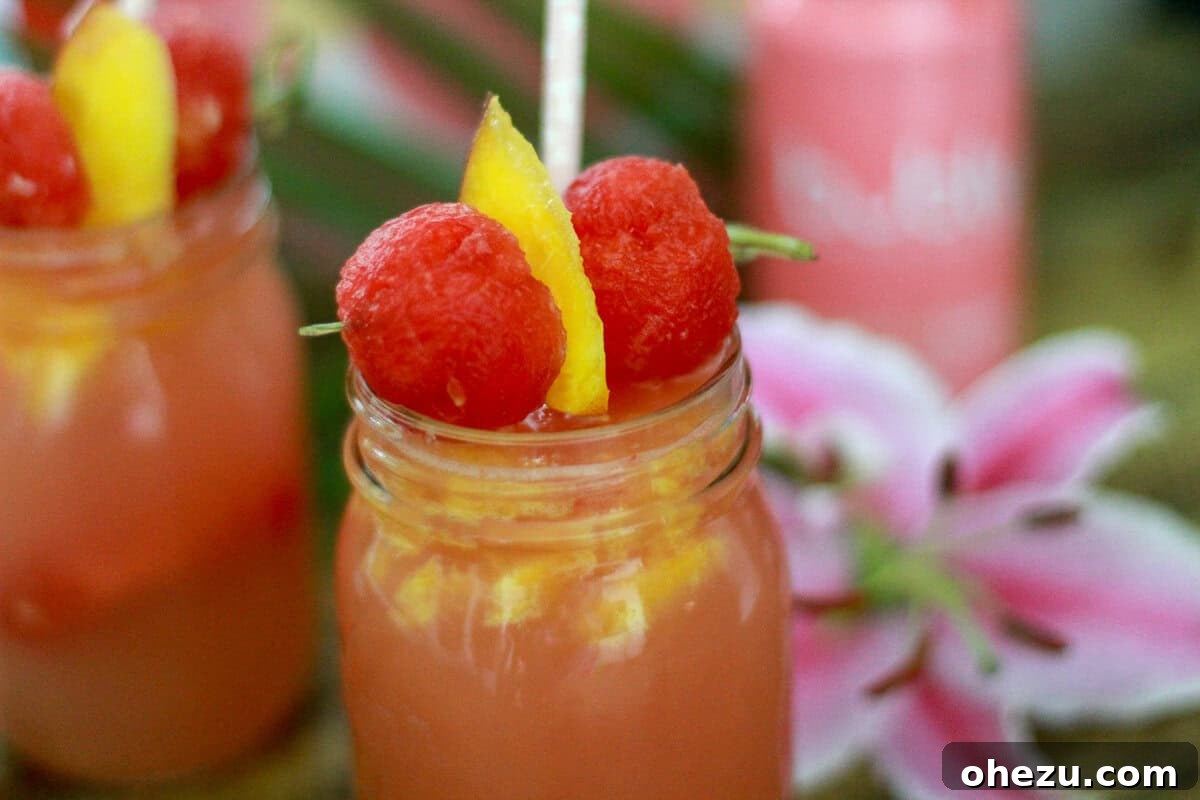 Bubly Watermelon Peach Spritzer 3 Close-up of a Bubly™ Sparkling Watermelon Peach Cocktail with fresh fruit garnish